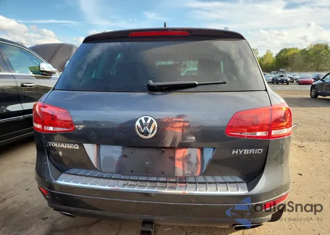 2012 Volkswagen Touareg Hybrid from USA, damaged, VIN WVGFG9BP5CD004543